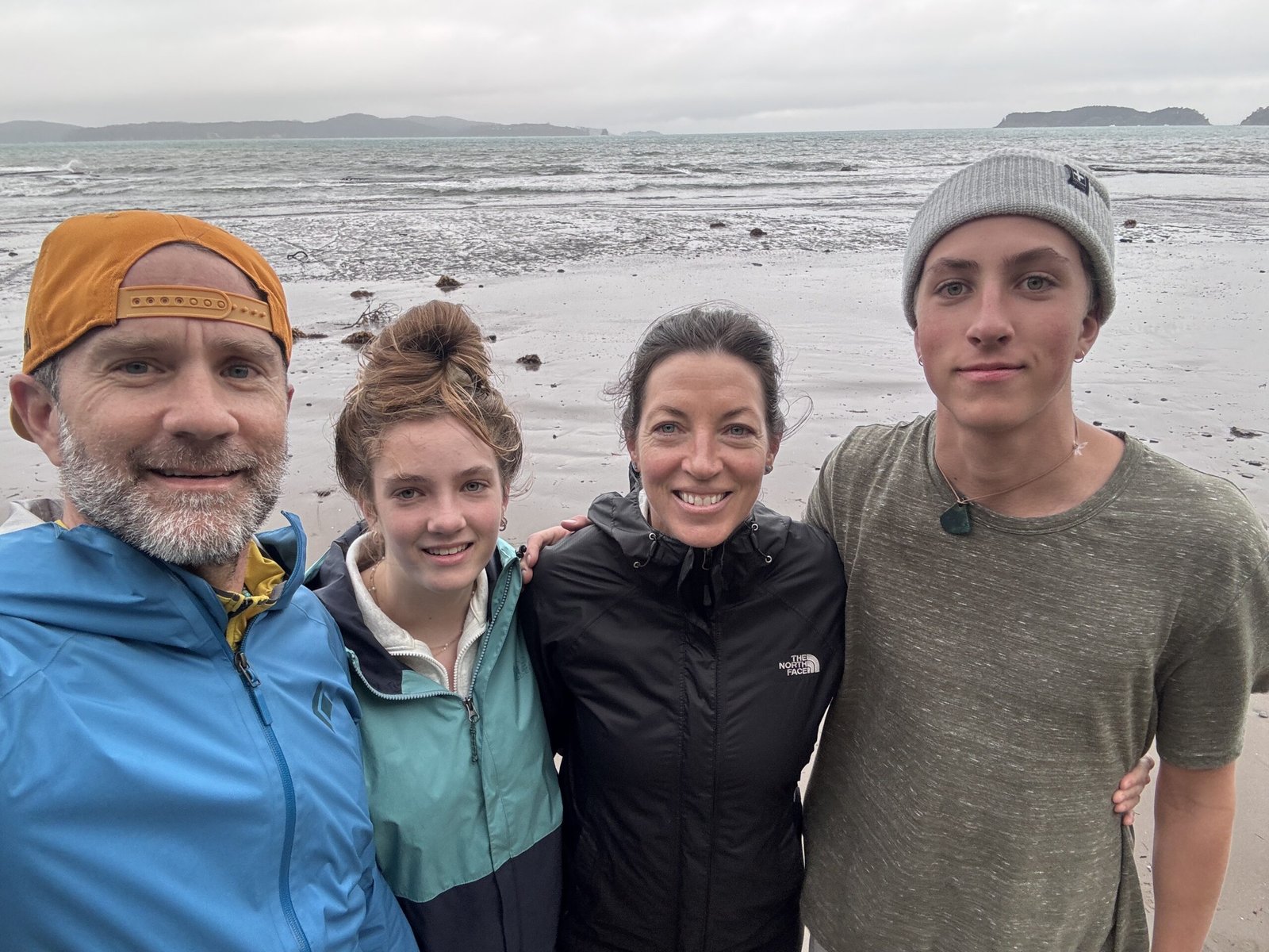 Jayson Gaddis with his family on the beach